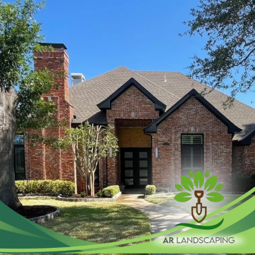 Brick home with manicured lawn